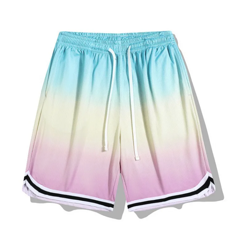 Pastel gradient athletic shorts with drawstring and stripes.