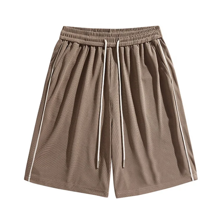 Brown athletic shorts with white drawstrings.