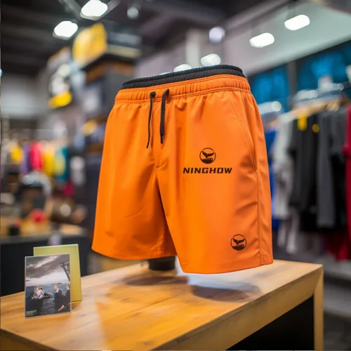 Golf Clothing 8 Bright orange sports shorts on display in a store.