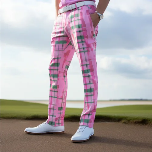 Golf Clothing 9 Man in pink plaid pants on golf course.