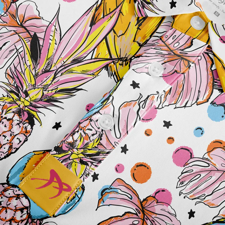 Colorful tropical print shirt with pineapples and leaves.
