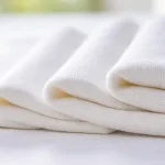 Four textile swatches with different GSM weights shown side by side