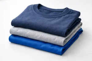 Home 42 A high-quality image showing neatly arranged team t-shirts in various fabric types for clear material comparison.