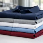 A clear image of high-quality long sleeve cotton polo shirts, emphasizing cuff and collar construction quality, suitable for corporate uniform sourcing.